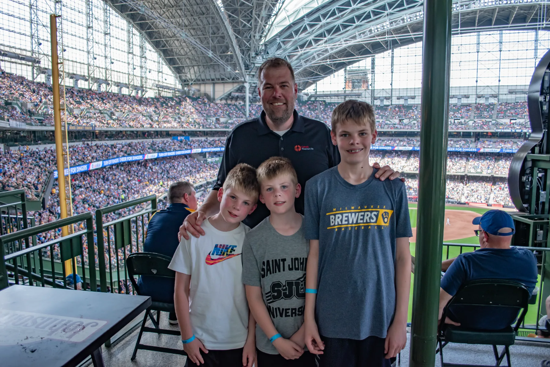 Families enjoying a Day of Faith ballpark gathering