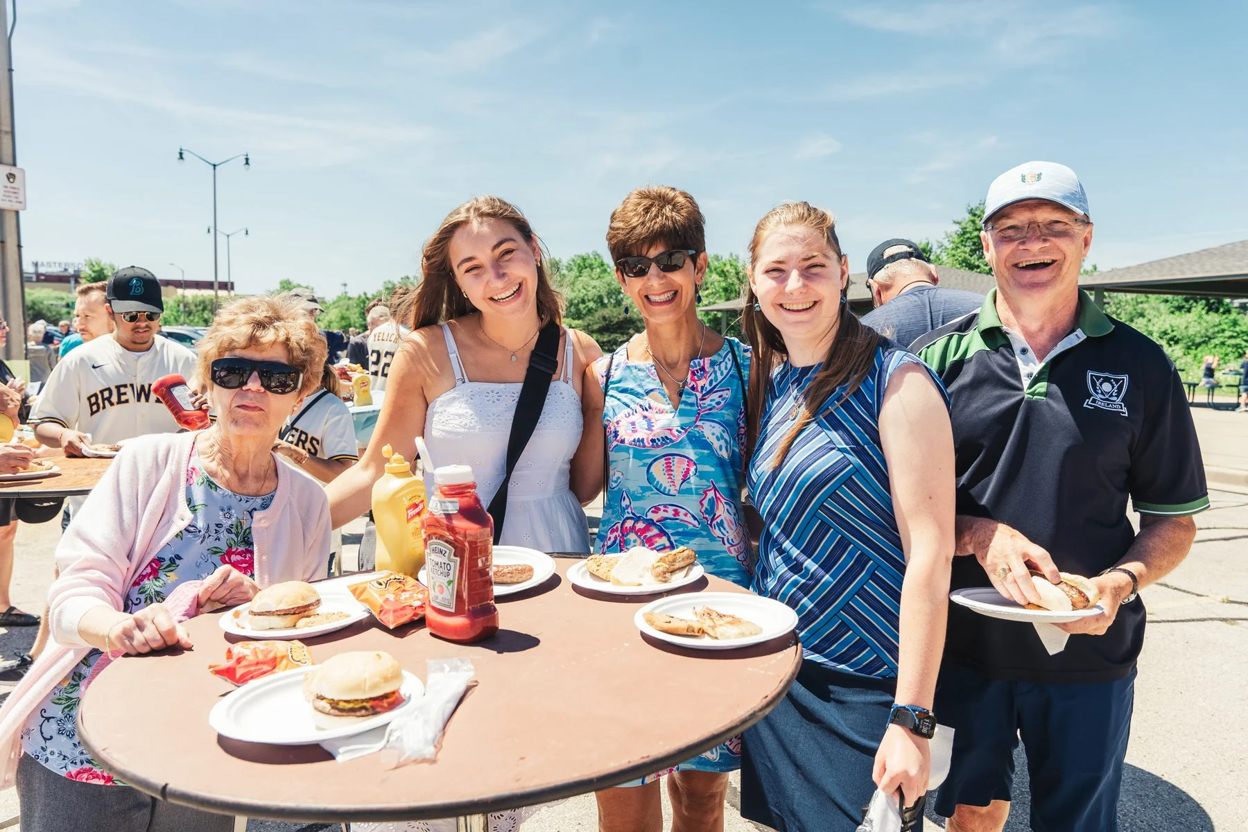 Guests enjoying tailgate food and fellowship